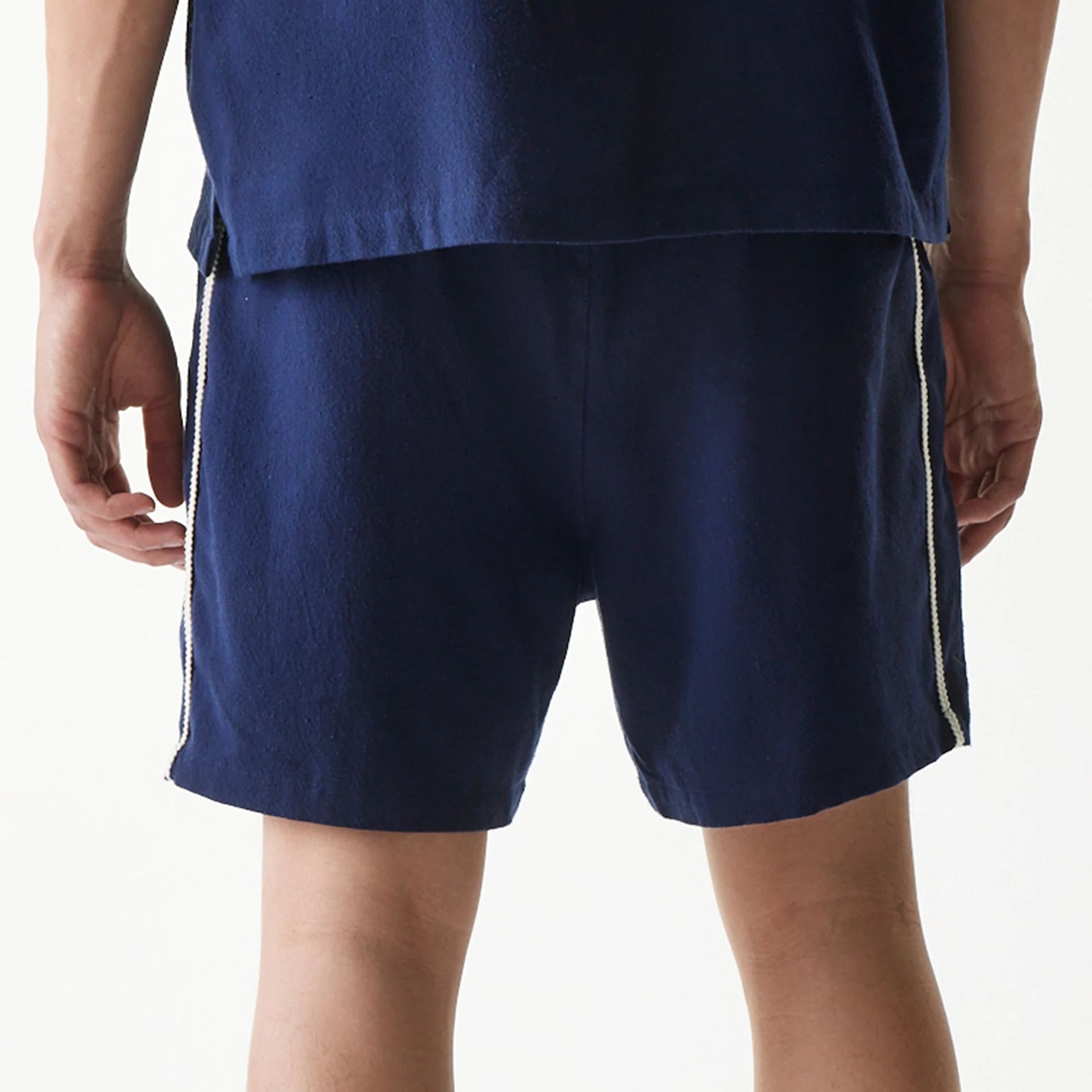The Male model is wearing New York Yankees MLB Piping Navy Shorts 6