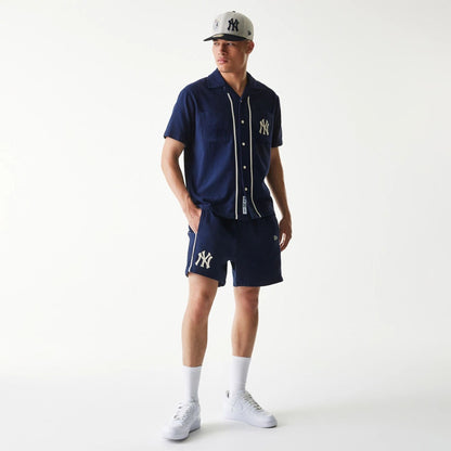 The Male model is wearing New York Yankees MLB Piping Navy Shorts 7