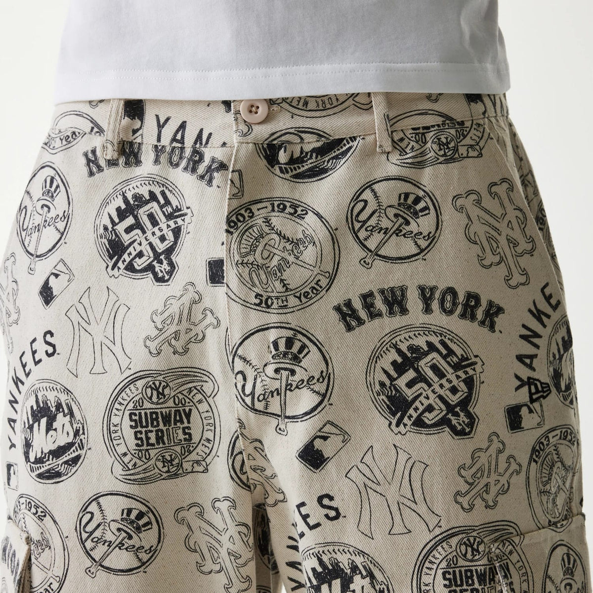 The Male model is wearing MLB Subway Series All Over Print Cargo Trousers 4