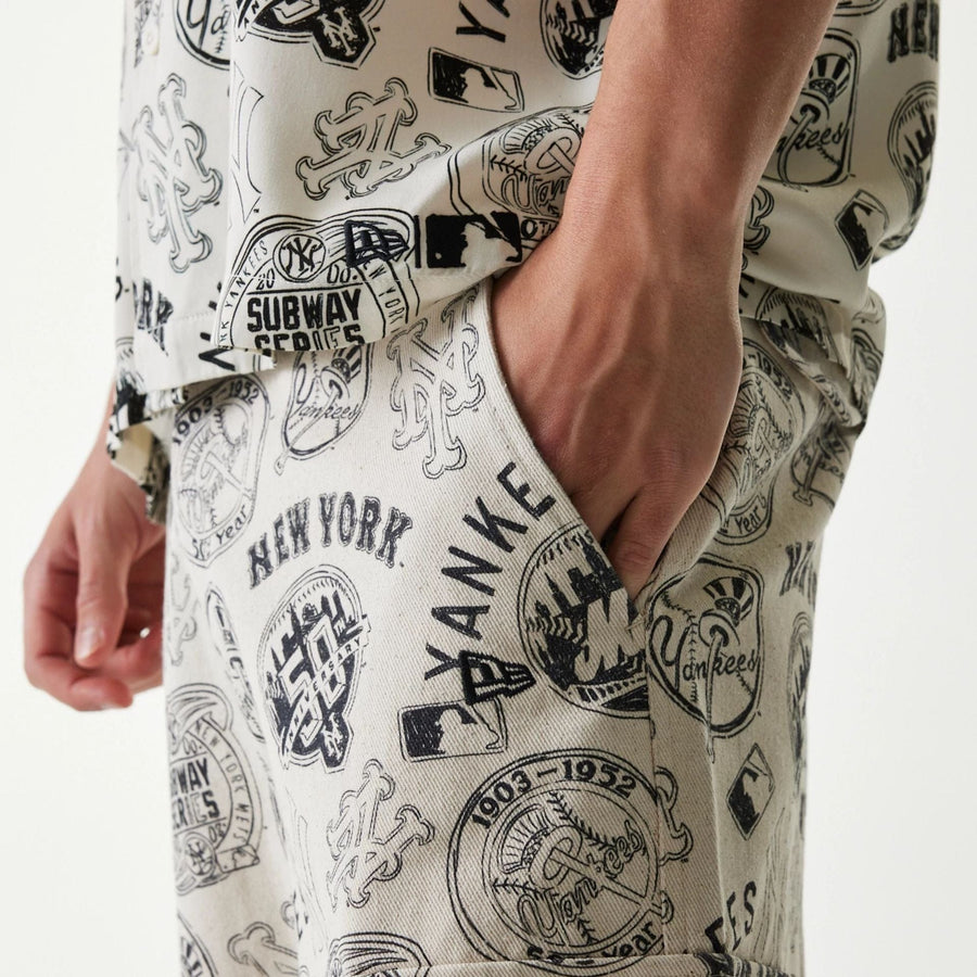 The Male model is wearing MLB Subway Series All Over Print Cargo Trousers 3