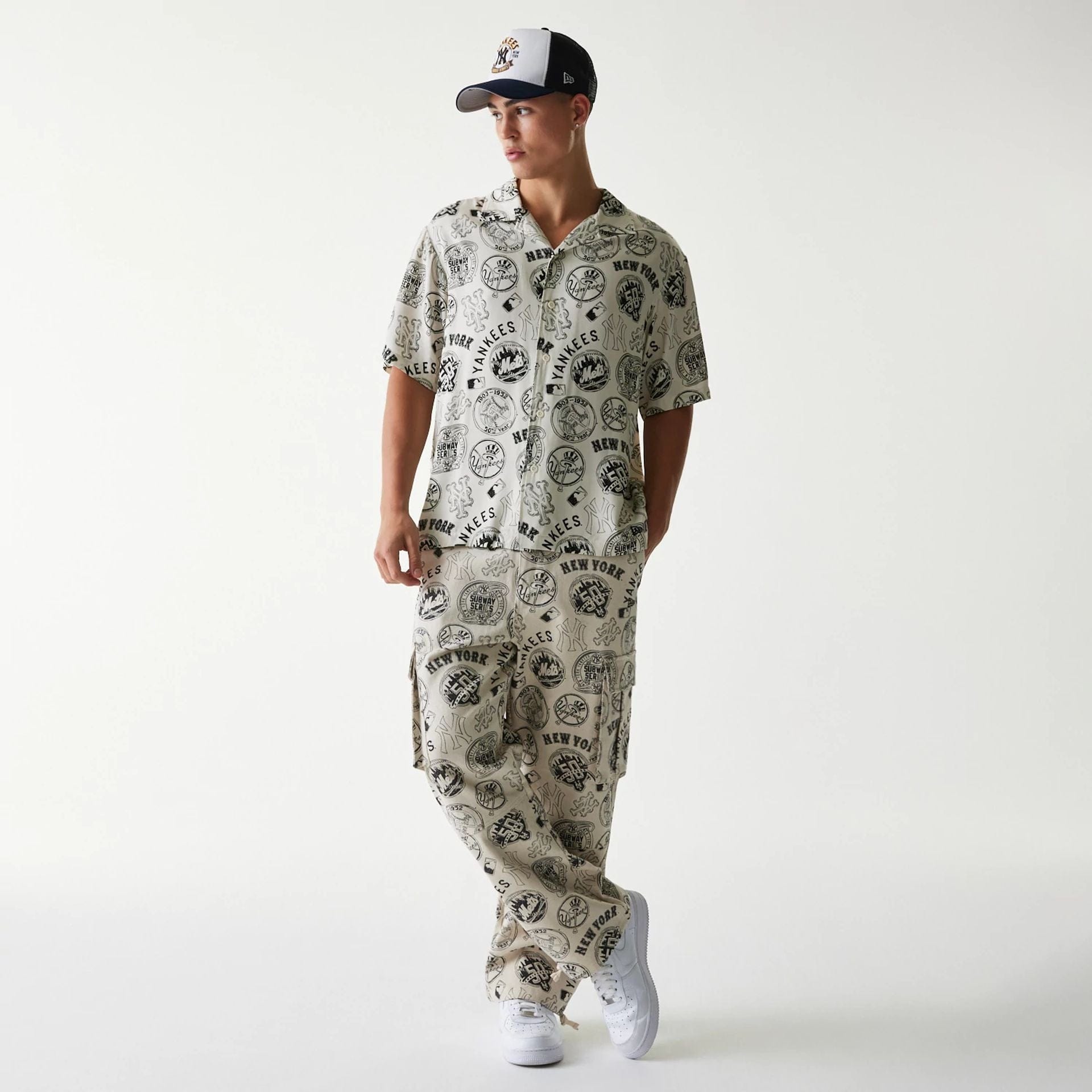 The Male model is wearing MLB Subway Series All Over Print Cargo Trousers 8