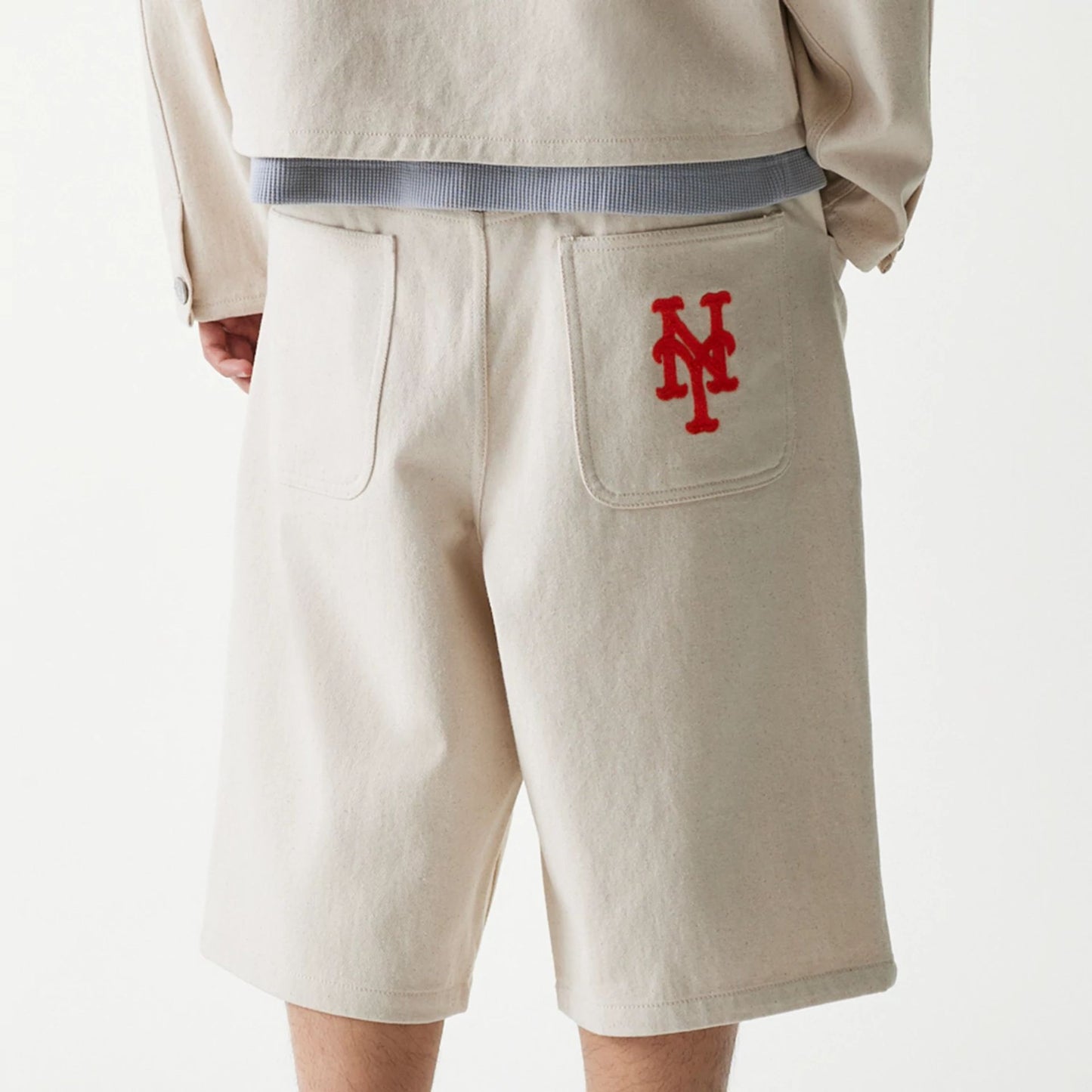 The Male model is wearing New York Mets MLB Jorts Open Cream Shorts 6