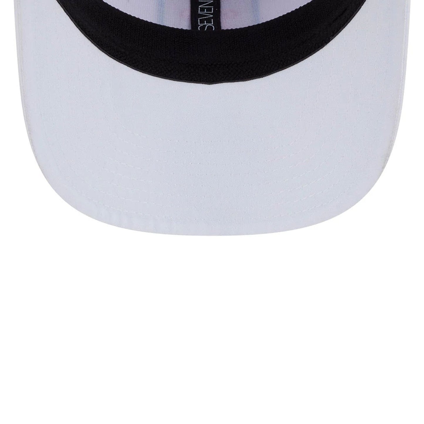 This is a Rangegoats LIV Golf 2025 White 9SEVENTY Stretch Snap Adjustable Cap 7