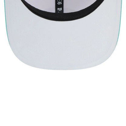 This is a Torque LIV Golf 2025 White 9SEVENTY Stretch Snap Adjustable Cap 2