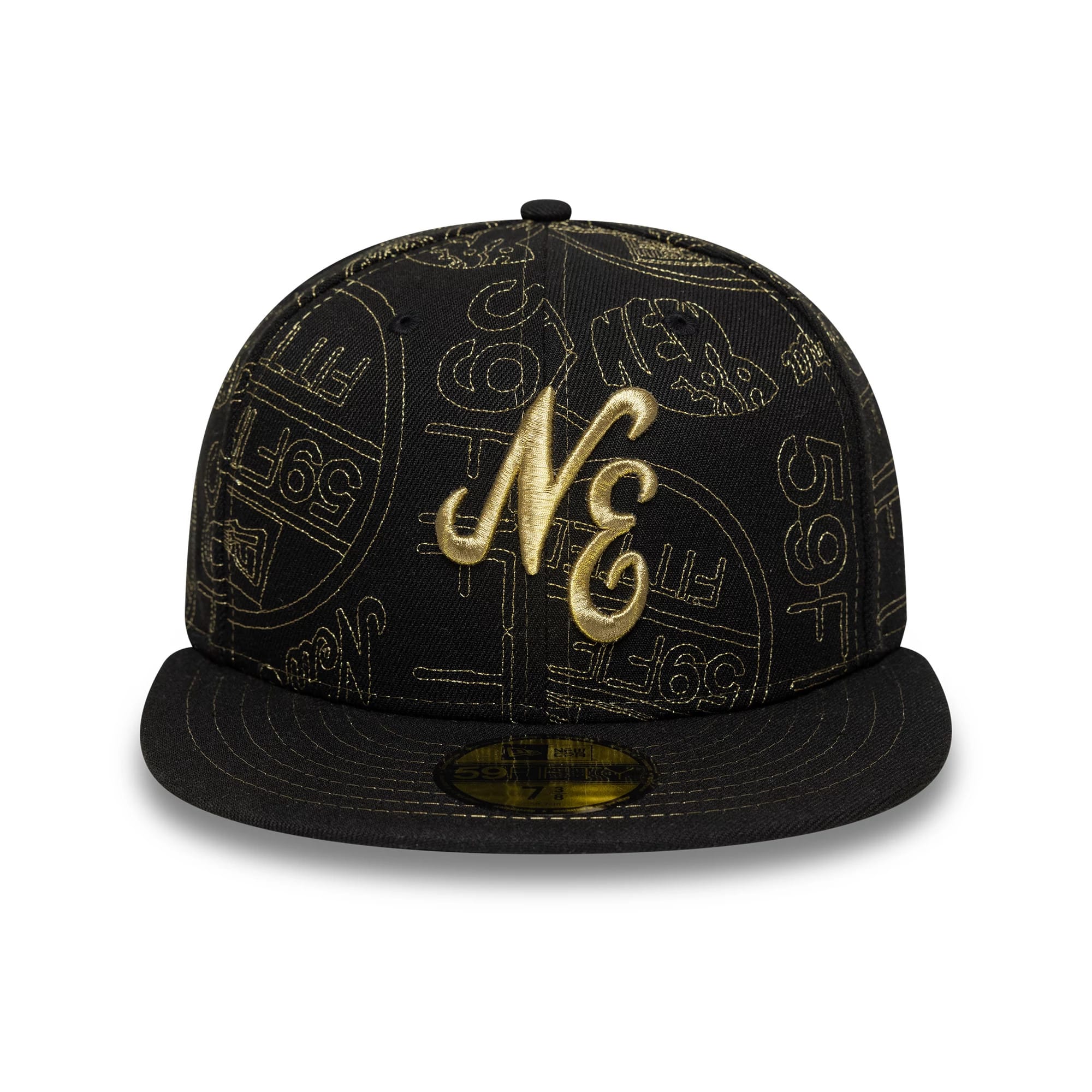 New Era Sticker Black 59FIFTY Fitted Cap, front view showing large gold NE embroidery on the gold patterned front panels, with a flat black visor and a gold 59FIFTY size sticker on top.