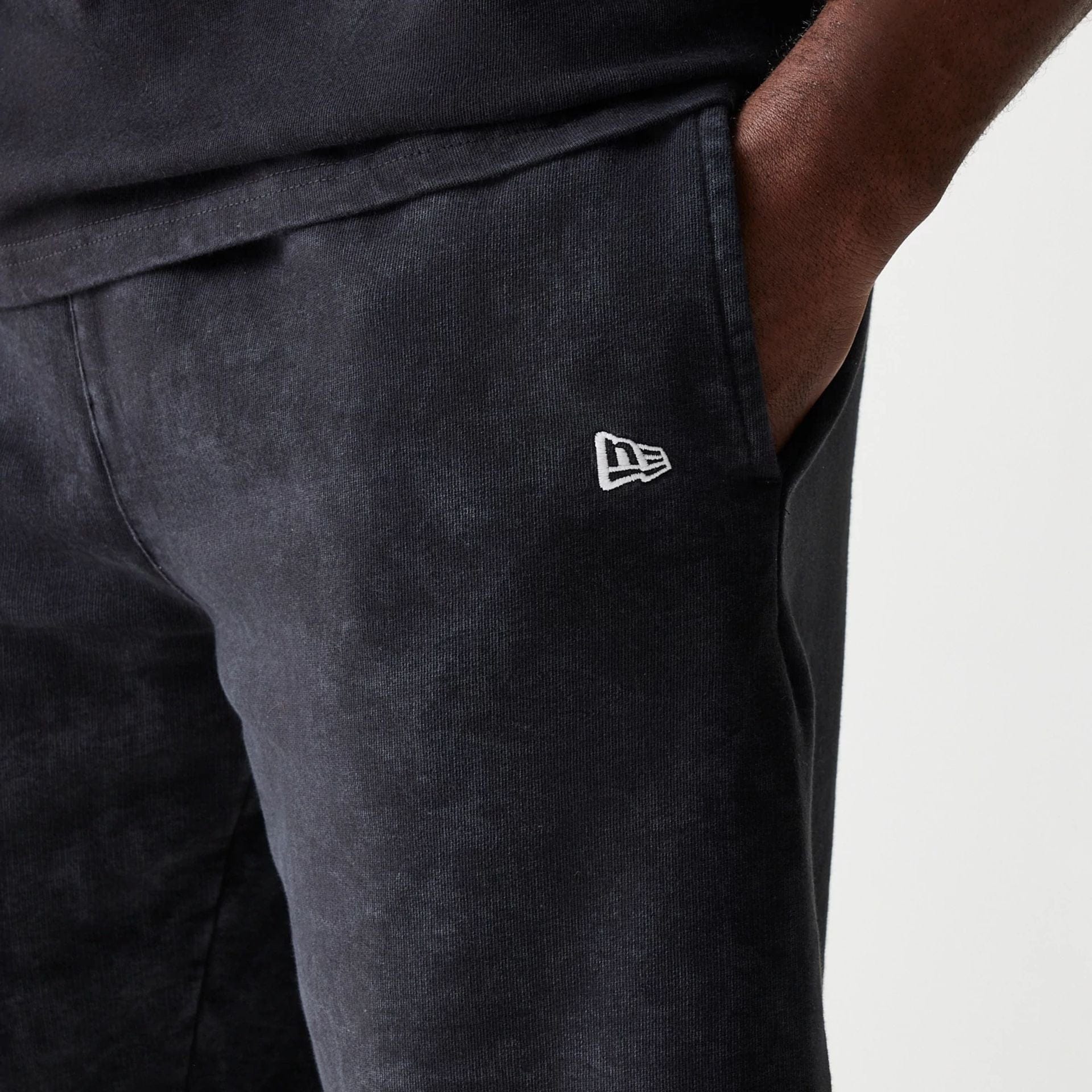 The Male model is wearing McLaren Racing Wordmark Black Oversized Shorts 3