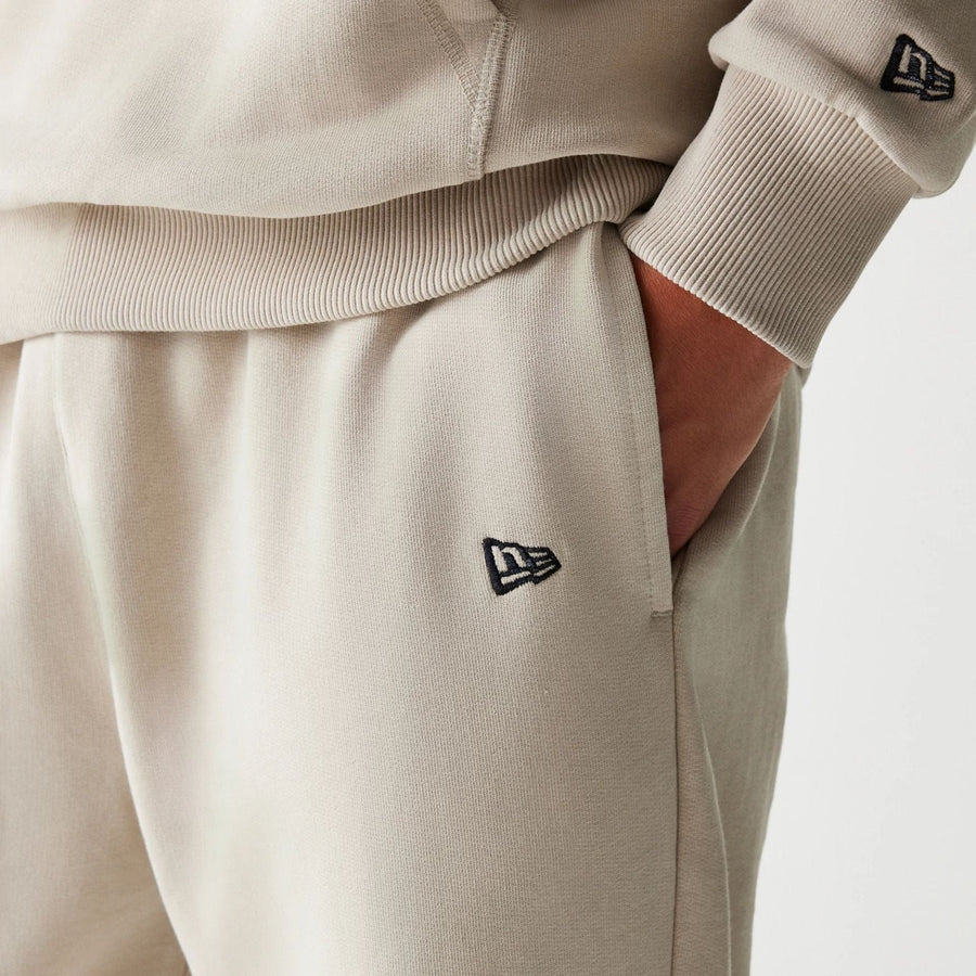 The Male model is wearing McLaren Racing Light Beige Straight Leg Joggers 4