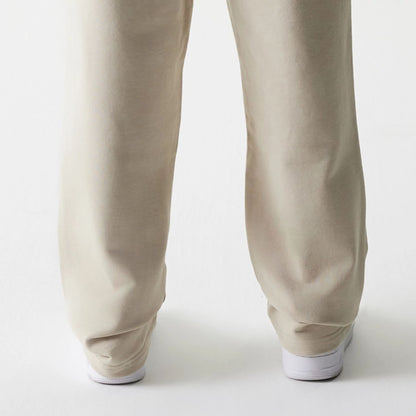 The Male model is wearing McLaren Racing Light Beige Straight Leg Joggers 6