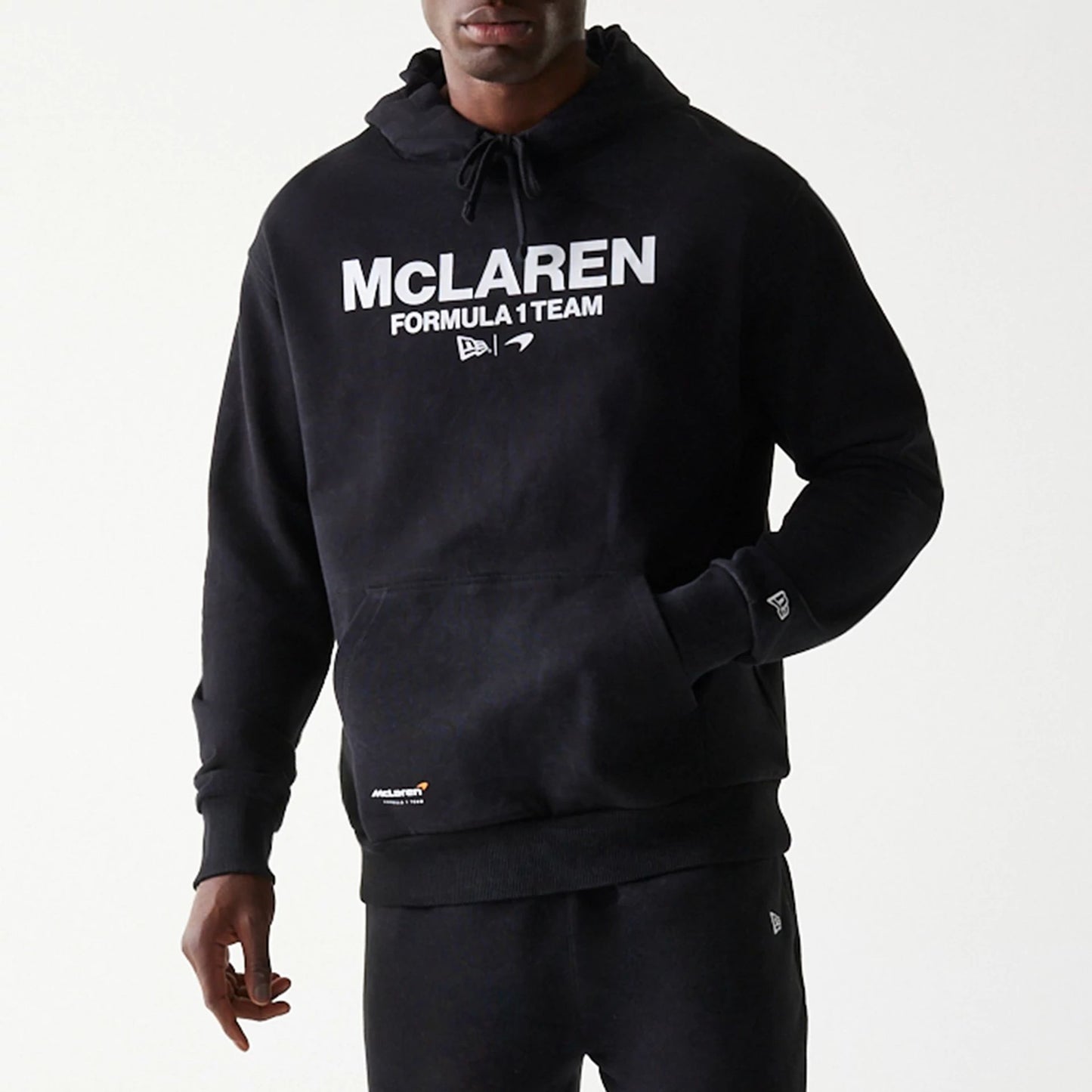 The Male model is wearing McLaren Racing Wordmark Black Oversized Pullover Hoodie 3