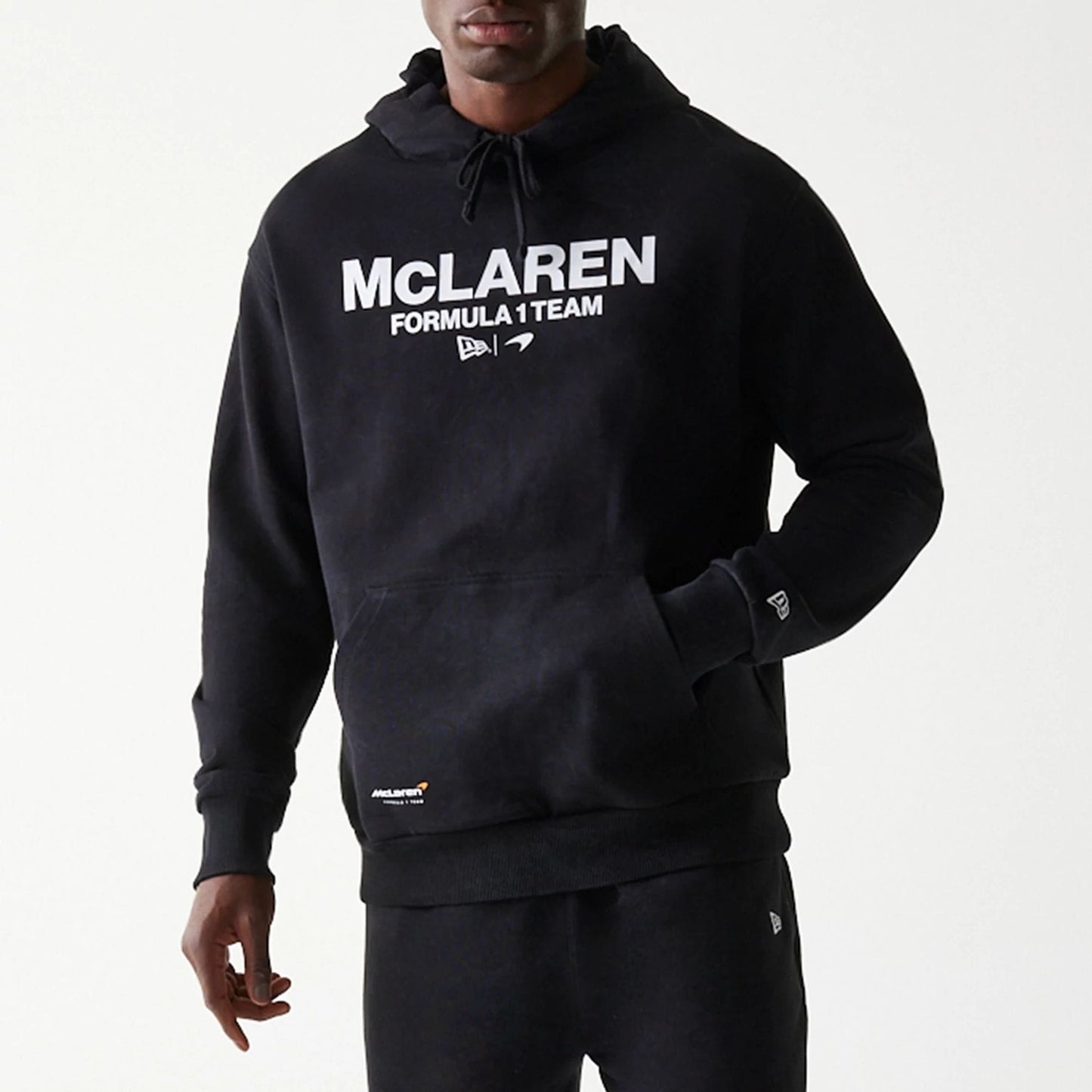 The Male model is wearing McLaren Racing Wordmark Black Oversized Pullover Hoodie 3