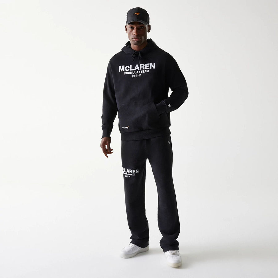 The Male model is wearing McLaren Racing Wordmark Black Oversized Pullover Hoodie 8