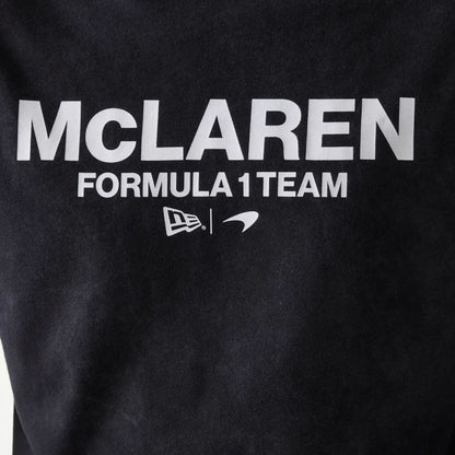 The Male model is wearing McLaren Racing Wordmark Black Oversized T-Shirt 4