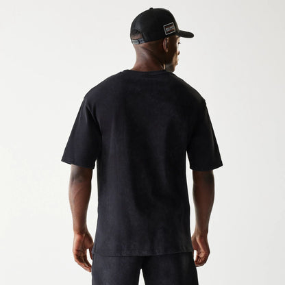 The Male model is wearing McLaren Racing Wordmark Black Oversized T-Shirt 2