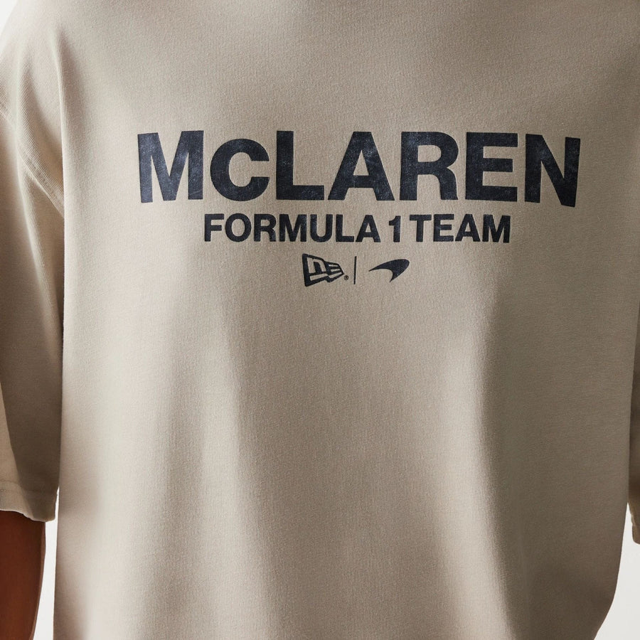 The Male model is wearing McLaren Racing Wordmark Light Beige Oversized T-Shirt 4