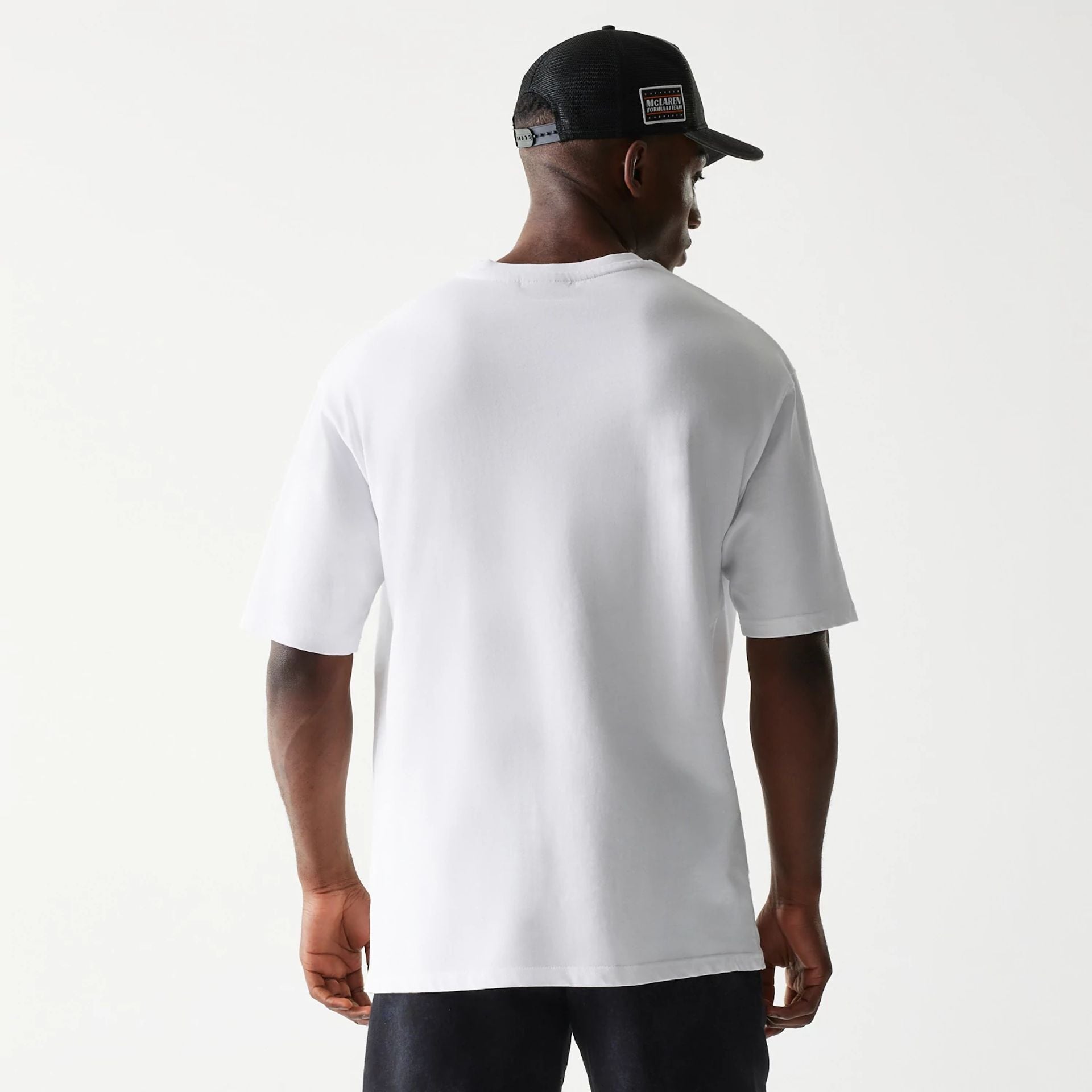 The Male model is wearing McLaren Racing Wordmark White Oversized T-Shirt 2