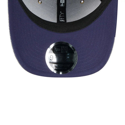 This is a MoneyGram Haas Formula 1 Esteban Ocon Vegas Race Special Navy 9FIFTY Stretch Snap Adjustable Cap 7