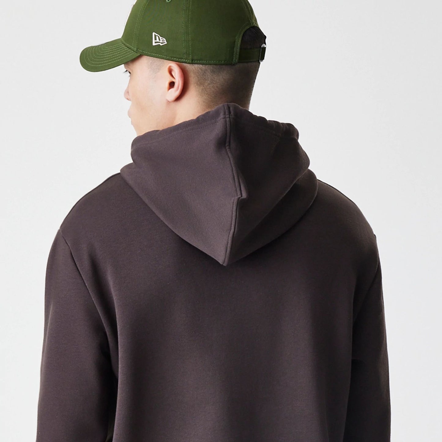 The Male model is wearing New York Yankees MLB Midi League Essential Dark Brown Oversized Pullover Hoodie  4