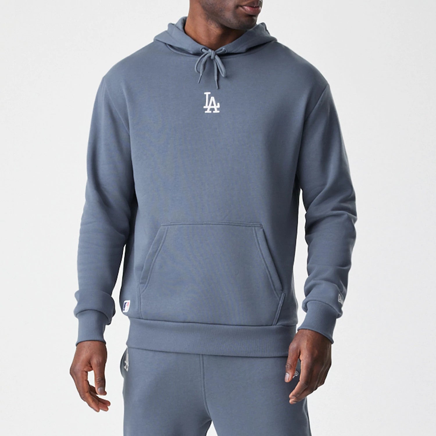 The Male model is wearing LA Dodgers MLB Midi League Essential Dark Grey Oversized Pullover Hoodie 3