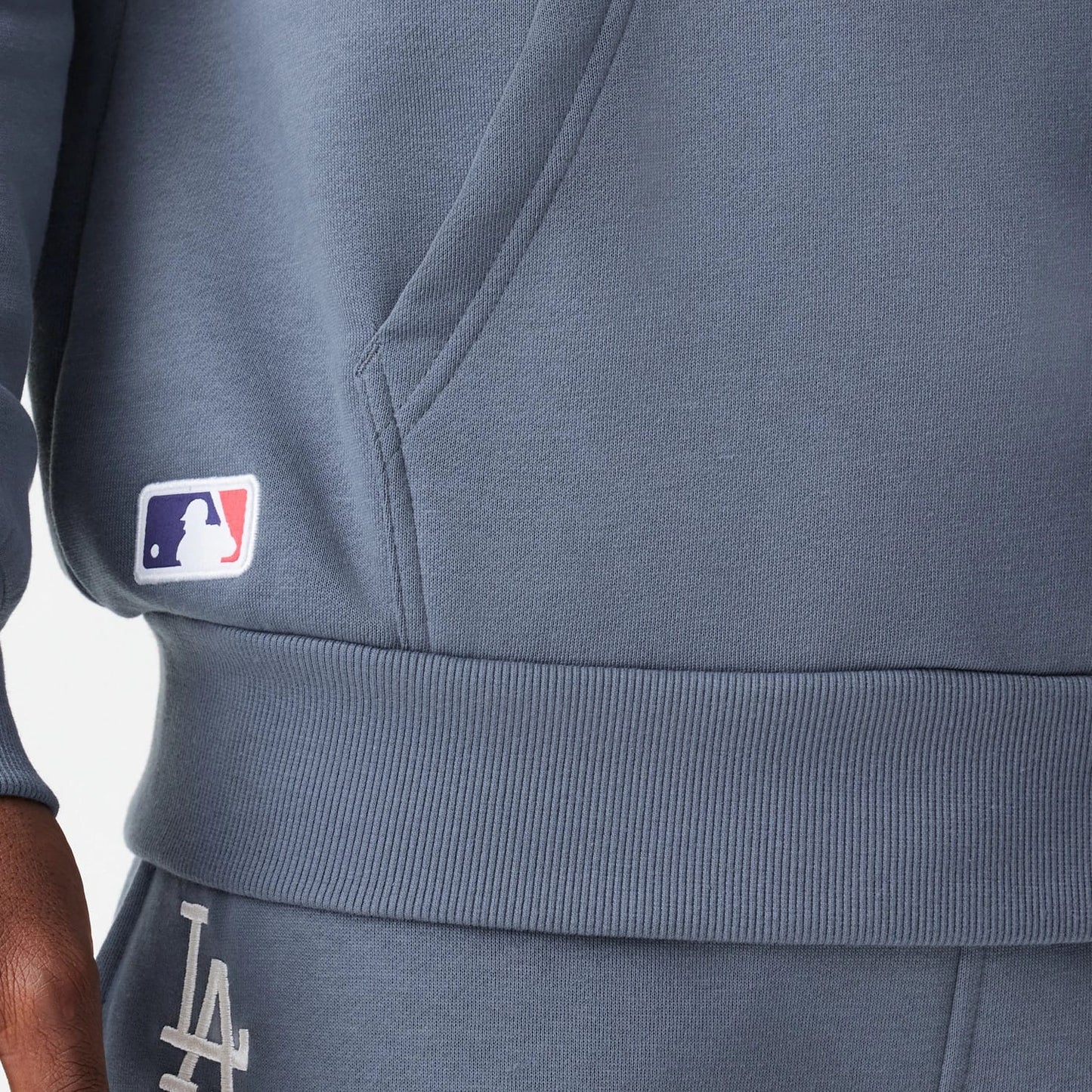 The Male model is wearing LA Dodgers MLB Midi League Essential Dark Grey Oversized Pullover Hoodie 7