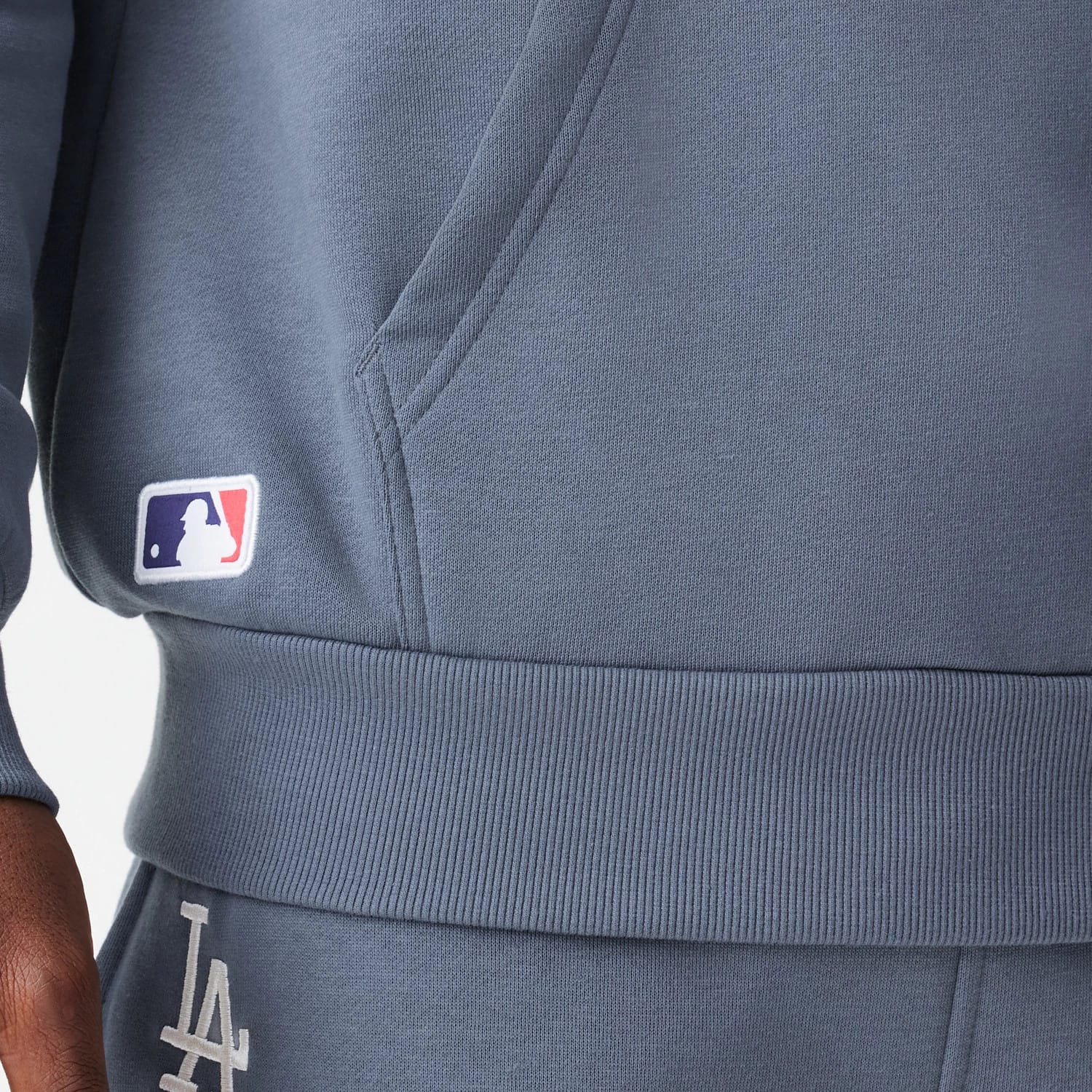 The Male model is wearing LA Dodgers MLB Midi League Essential Dark Grey Oversized Pullover Hoodie 7