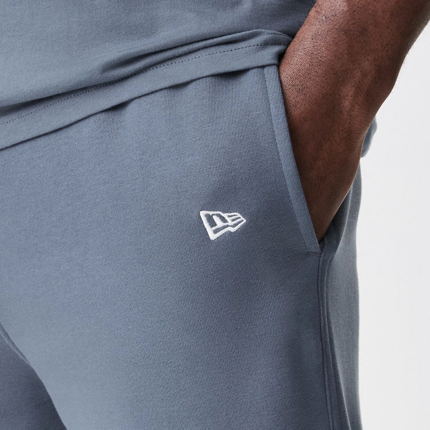 The Male model is wearing LA Dodgers MLB Midi League Essential Dark Grey Joggers  7