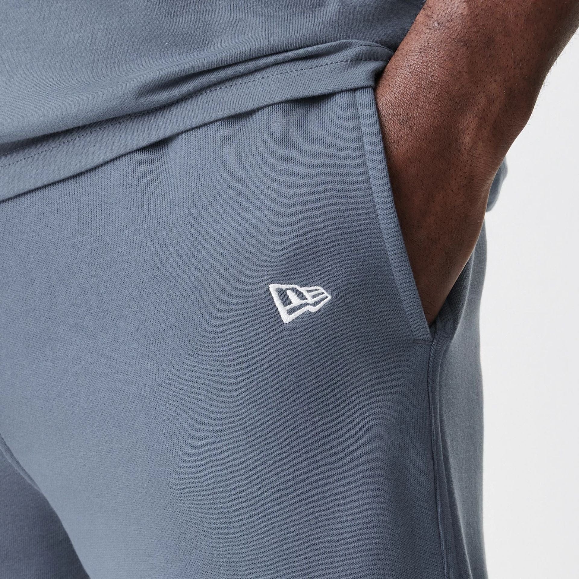 The Male model is wearing LA Dodgers MLB Midi League Essential Dark Grey Joggers  7