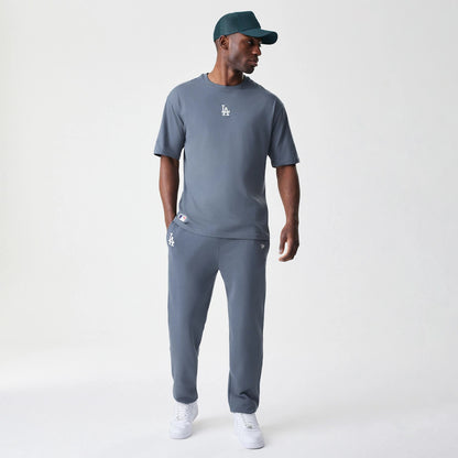 The Male model is wearing LA Dodgers MLB Midi League Essential Dark Grey Joggers 8