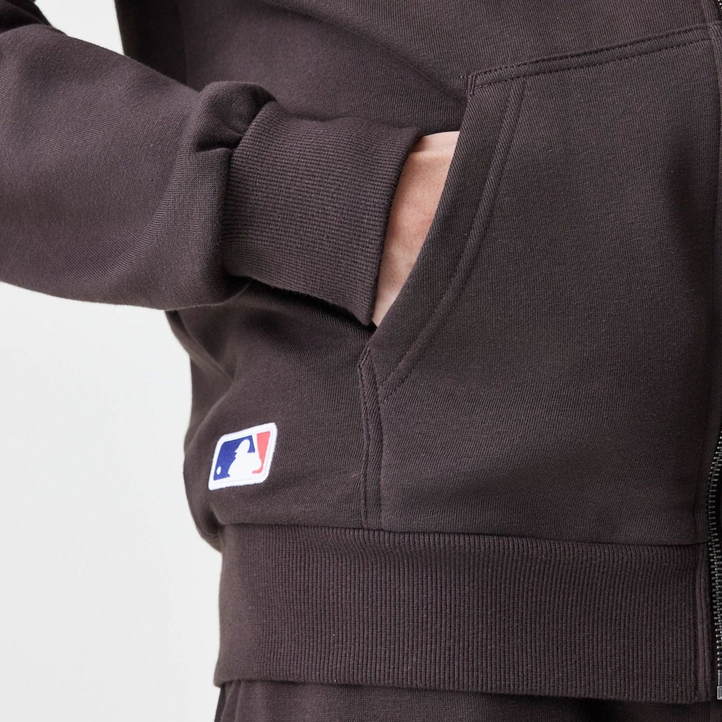 The Male model is wearing New York Yankees MLB Midi League Essential Dark Brown Full Zip Hoodie  4