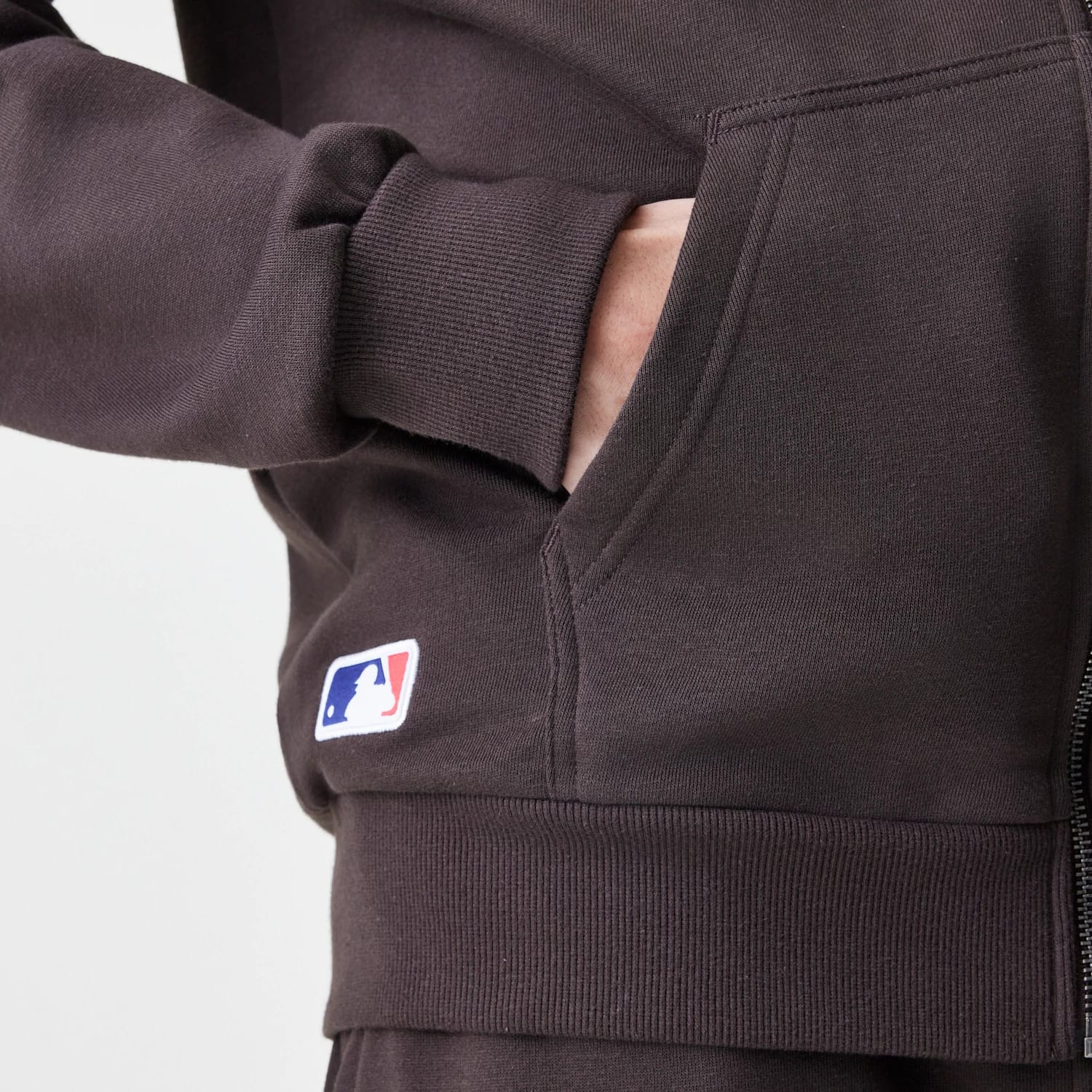 The Male model is wearing New York Yankees MLB Midi League Essential Dark Brown Full Zip Hoodie 4