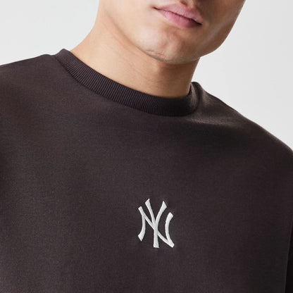 The Male model is wearing New York Yankees MLB Midi League Essential Dark Brown Oversized Crew Neck Sweater 4