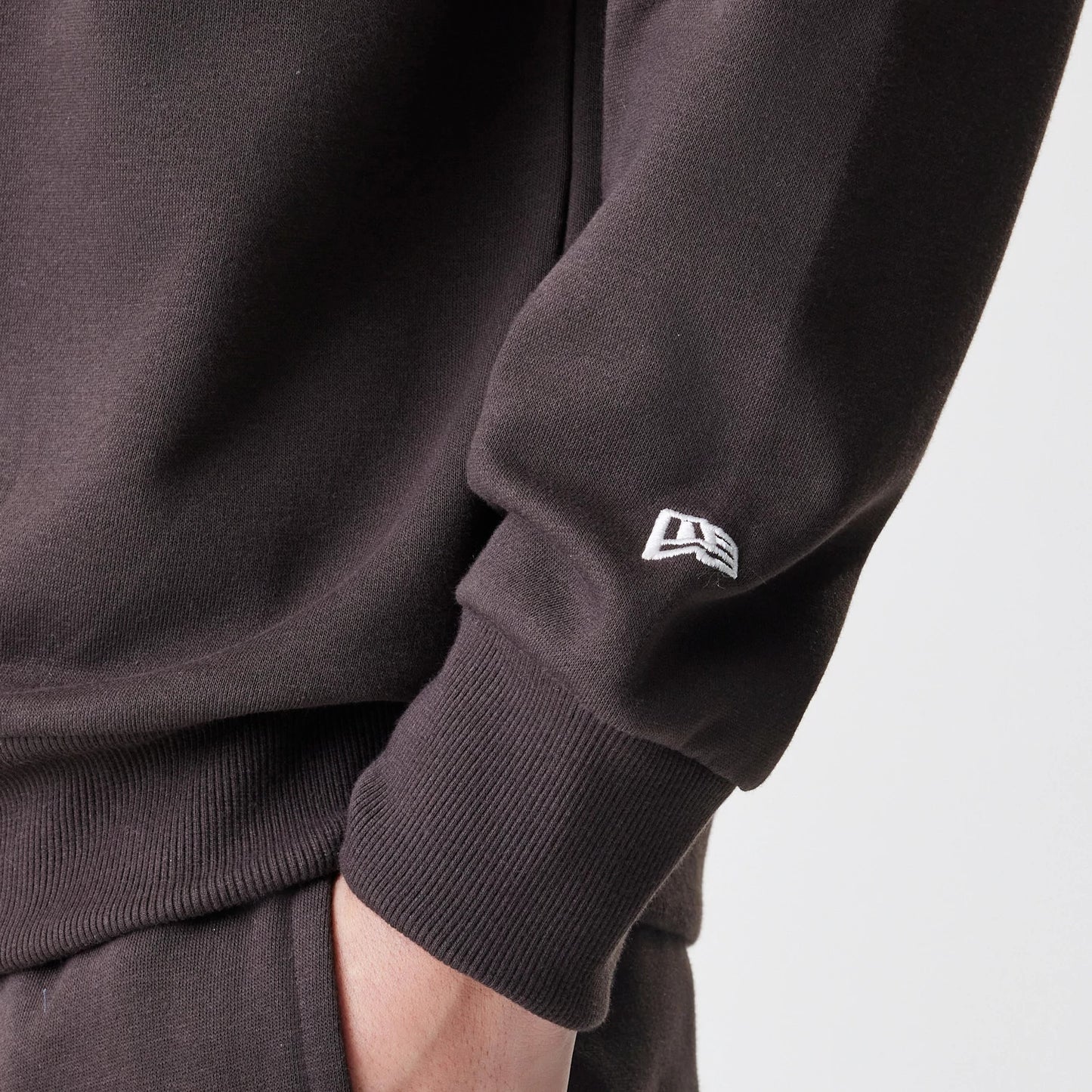 The Male model is wearing New York Yankees MLB Midi League Essential Dark Brown Oversized Crew Neck Sweater 5