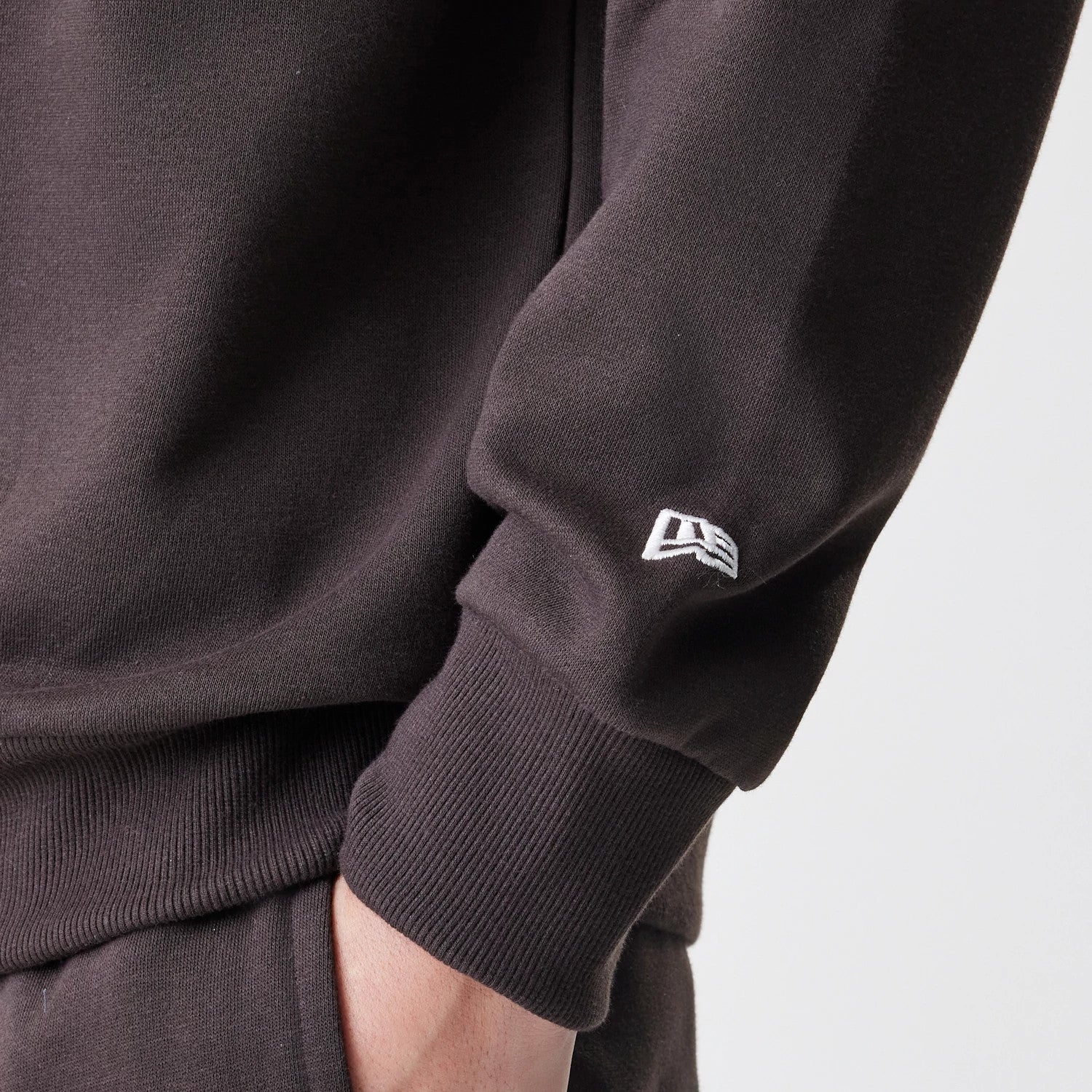 The Male model is wearing New York Yankees MLB Midi League Essential Dark Brown Oversized Crew Neck Sweater 5