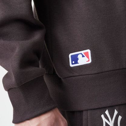 The Male model is wearing New York Yankees MLB Midi League Essential Dark Brown Oversized Crew Neck Sweater 6