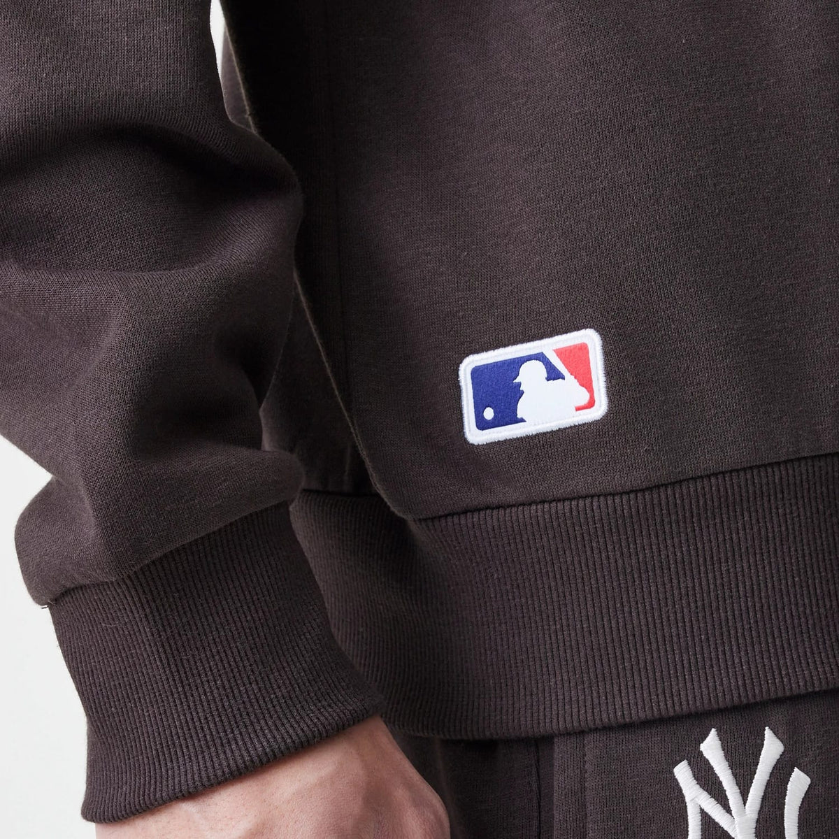 The Male model is wearing New York Yankees MLB Midi League Essential Dark Brown Oversized Crew Neck Sweater 6