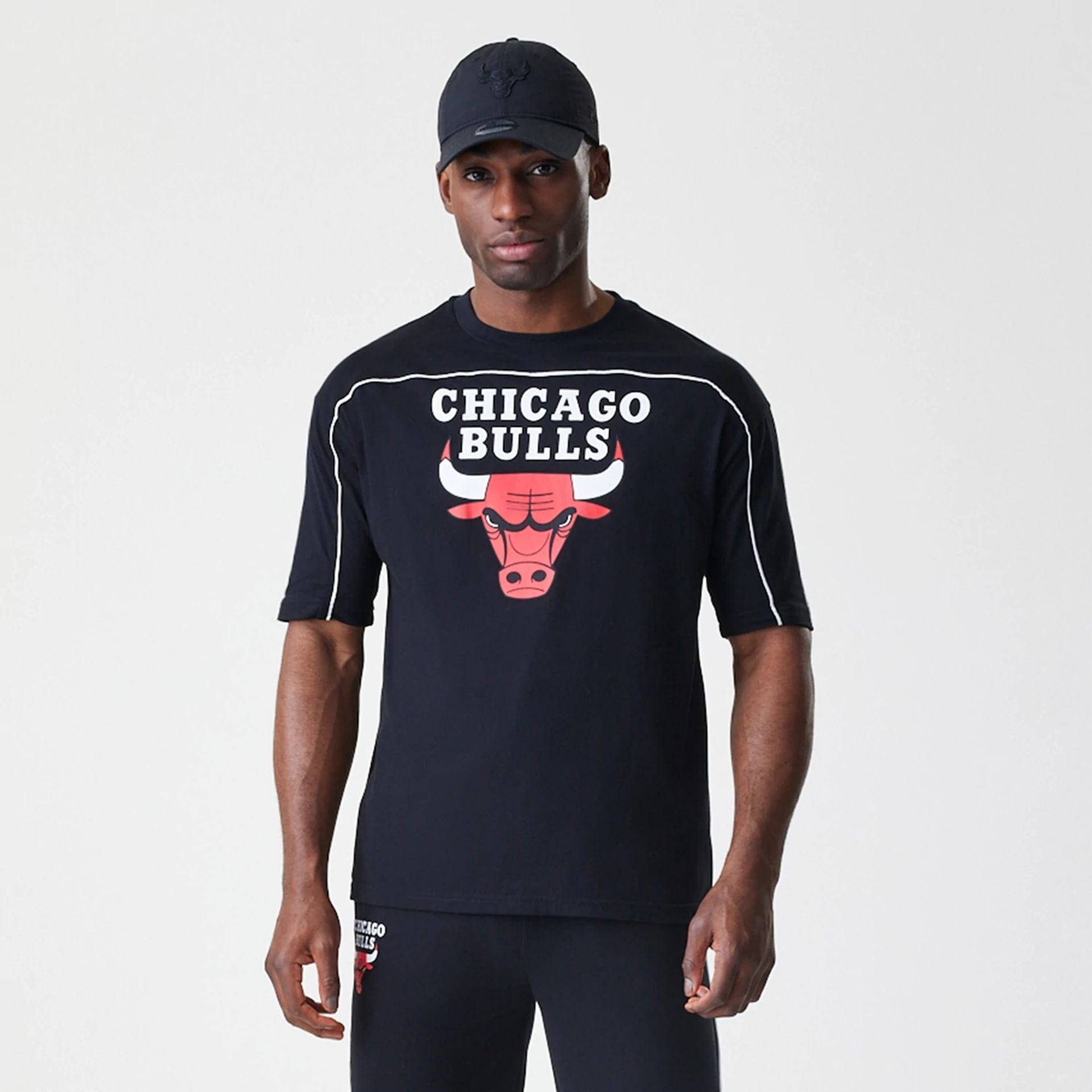 The Male model is wearing Chicago Bulls NBA Piping Black Oversized T-Shirt  3