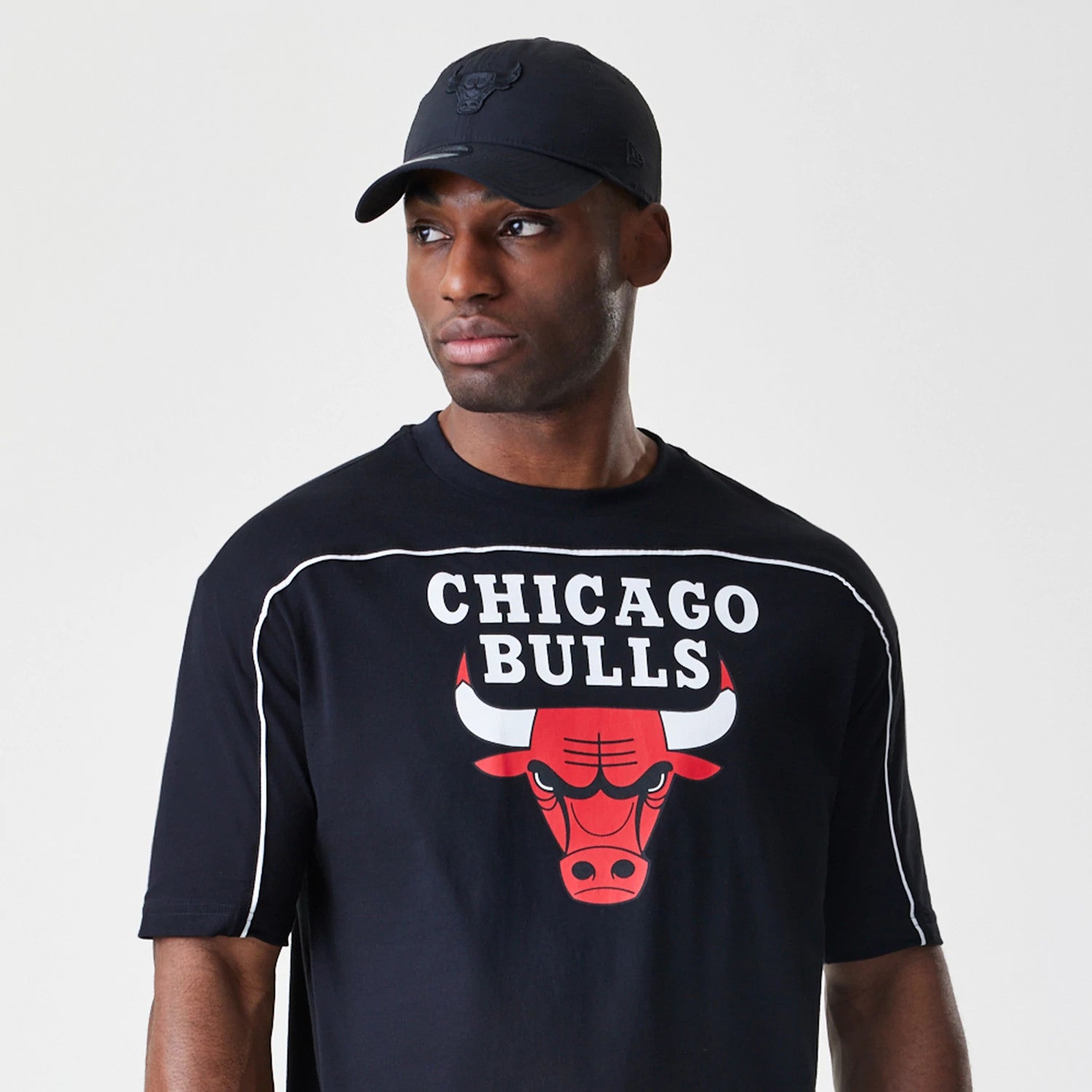 The Male model is wearing Chicago Bulls NBA Piping Black Oversized T-Shirt 6
