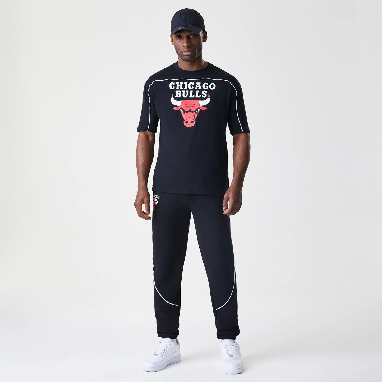 The Male model is wearing Chicago Bulls NBA Piping Black Oversized T-Shirt  8