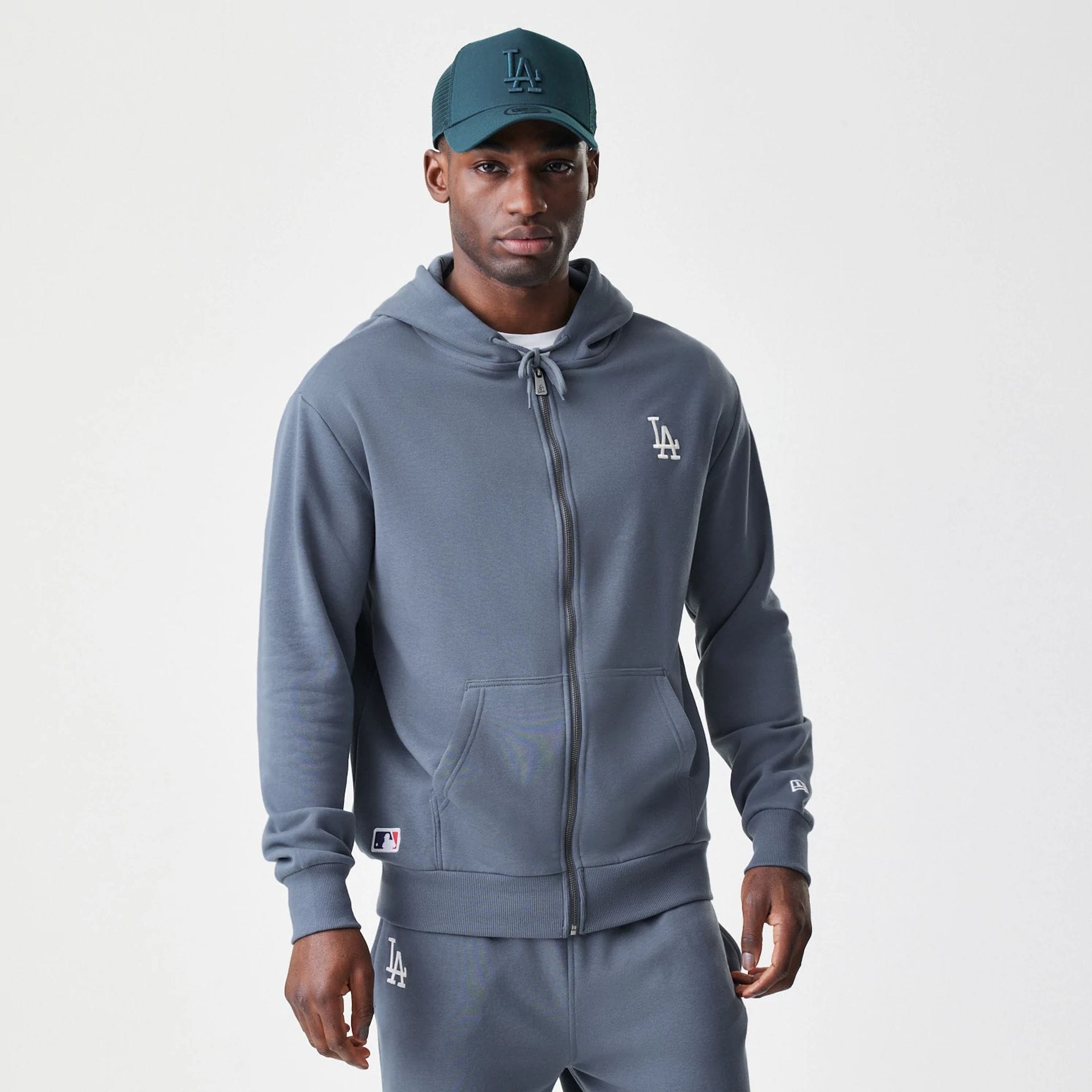 The Male model is wearing LA Dodgers MLB Midi League Essential Dark Grey Full Zip Hoodie  1