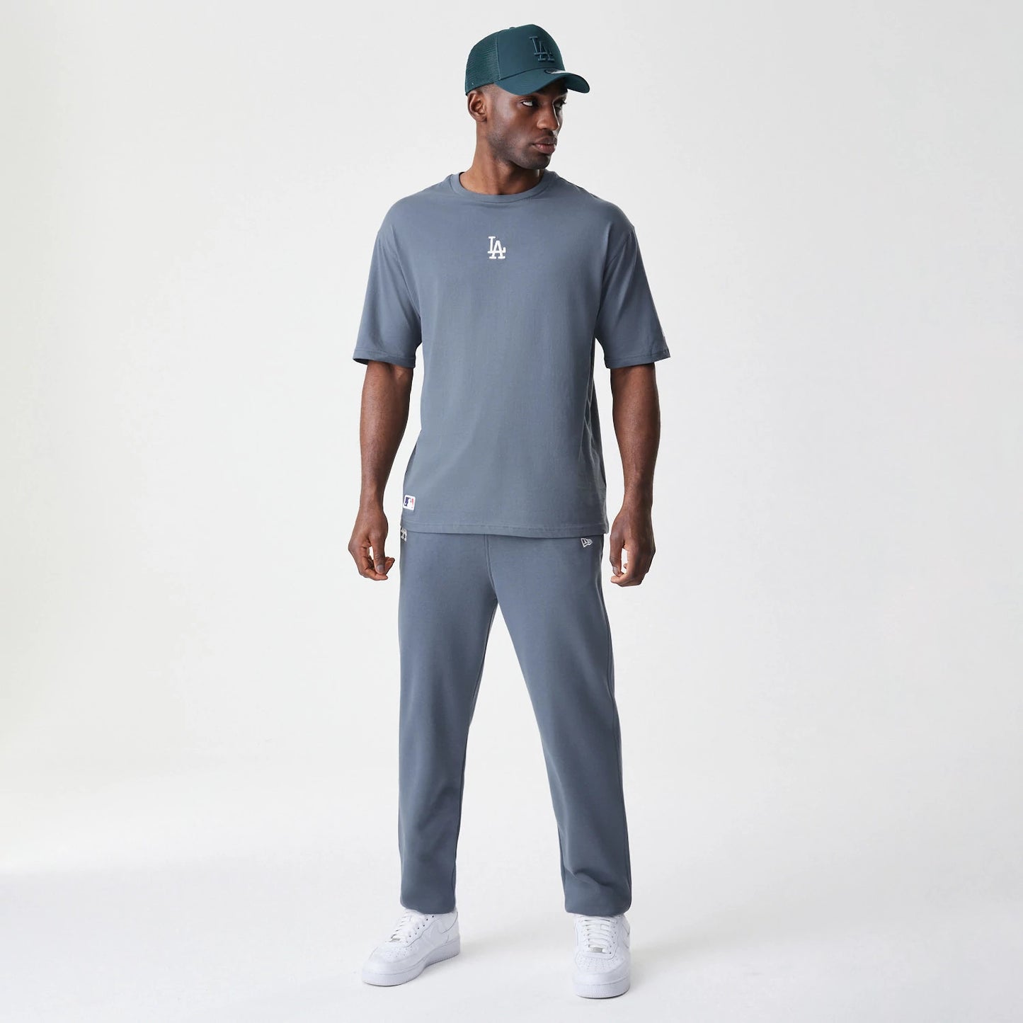 The Male model is wearing LA Dodgers MLB Midi League Essential Dark Grey Oversized T-Shirt 8