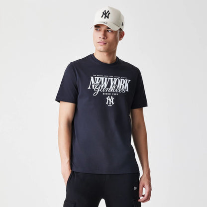 The Male model is wearing New York Yankees MLB Script Graphic Navy T-Shirt  1