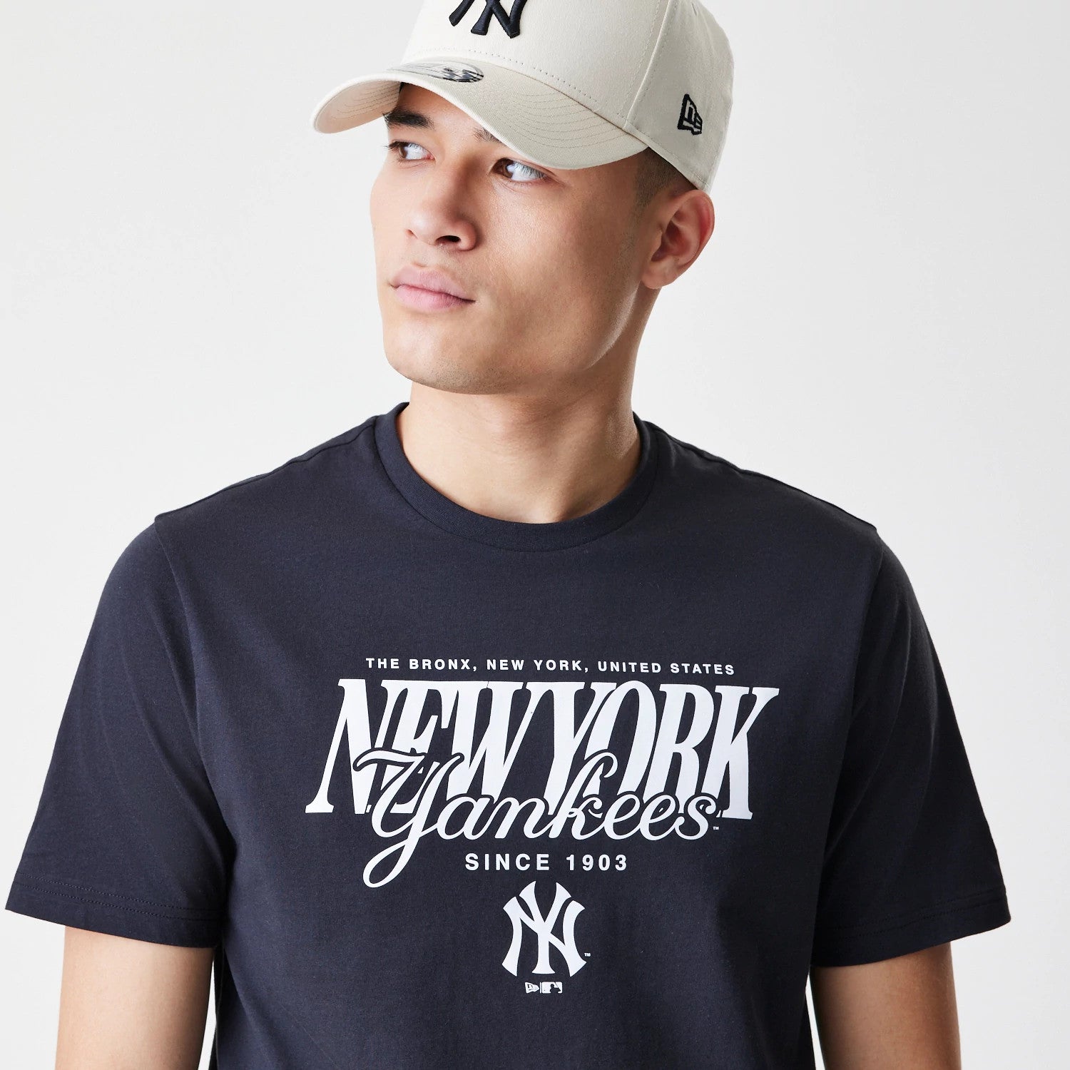 The Male model is wearing New York Yankees MLB Script Graphic Navy T-Shirt 4