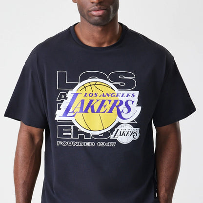 The Male model is wearing LA Lakers NBA Outline Graphic Navy Oversized T-Shirt  3