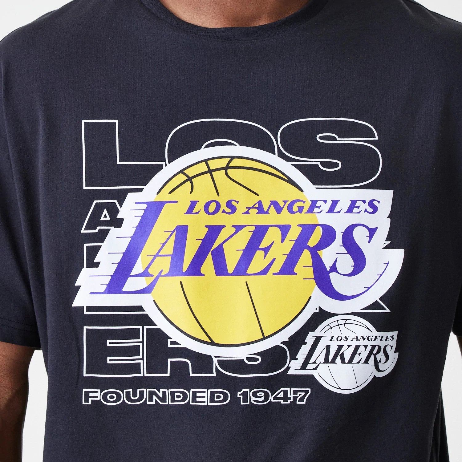 The Male model is wearing LA Lakers NBA Outline Graphic Navy Oversized T-Shirt 4