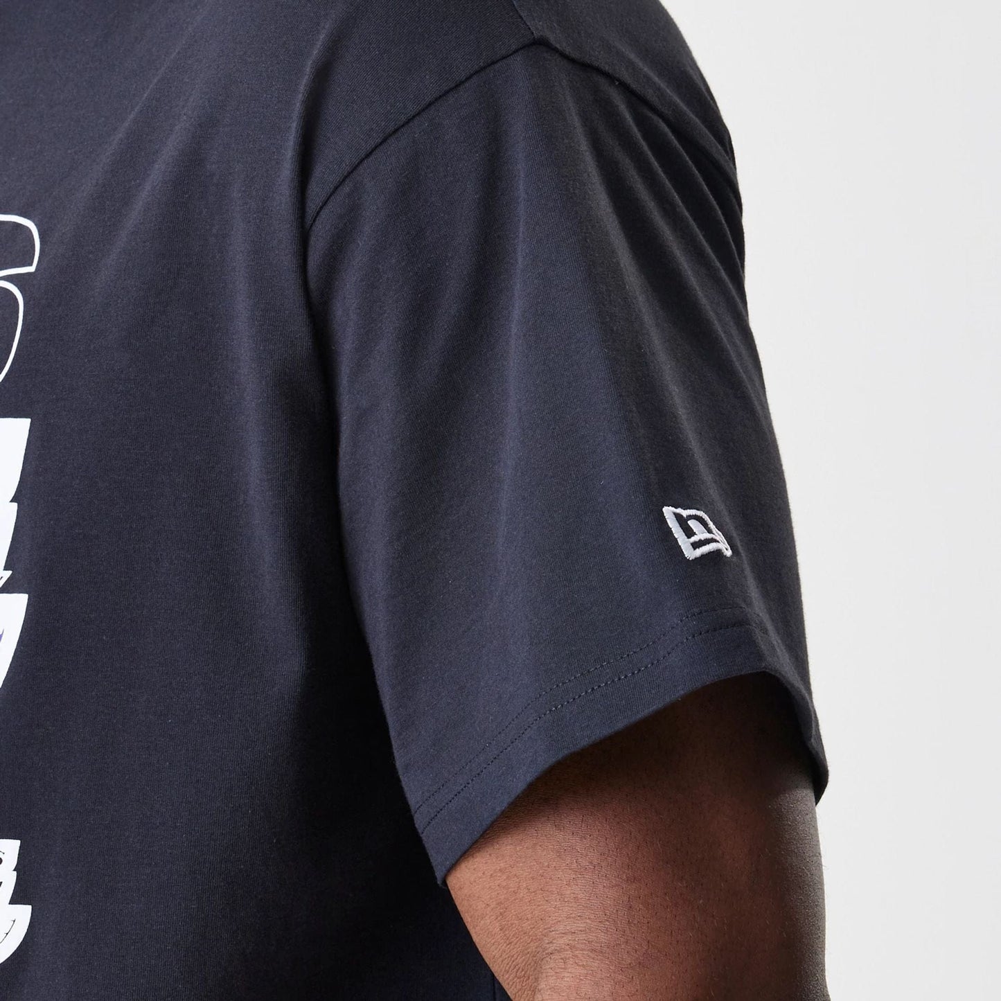 The Male model is wearing LA Lakers NBA Outline Graphic Navy Oversized T-Shirt  5