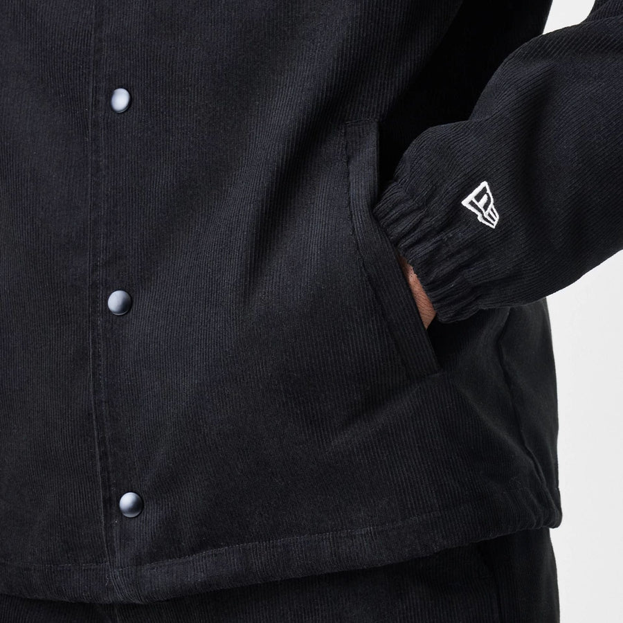 The Male model is wearing  New Era Cord Black Coaches Jacket  7