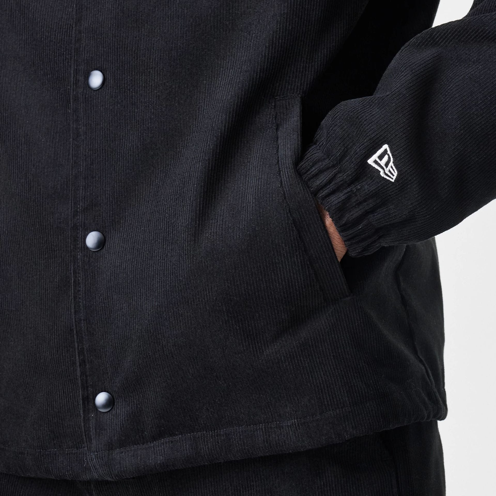 The Male model is wearing  New Era Cord Black Coaches Jacket  7