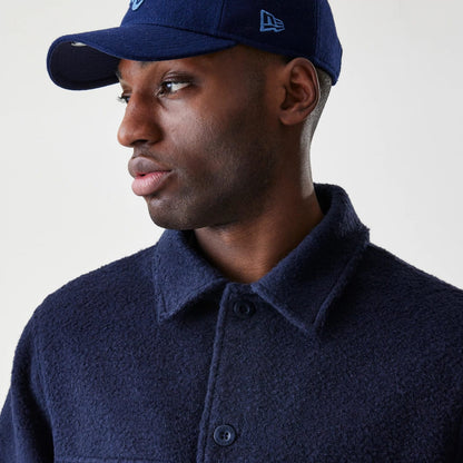 The Male model is wearing  New Era Borg Navy Shacket 4