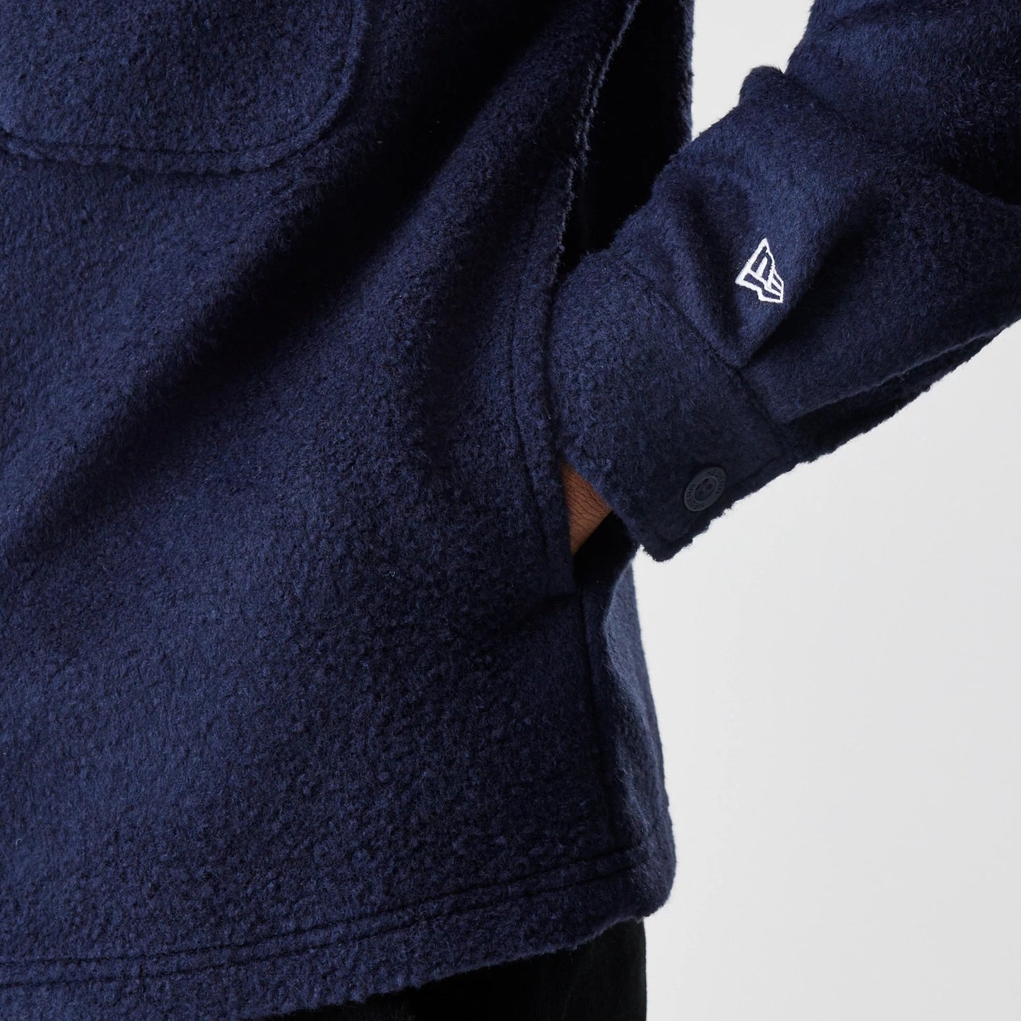 The Male model is wearing  New Era Borg Navy Shacket 5