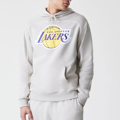 The Male model is wearing LA Lakers NBA Piping Cream Oversized Pullover Hoodie 3