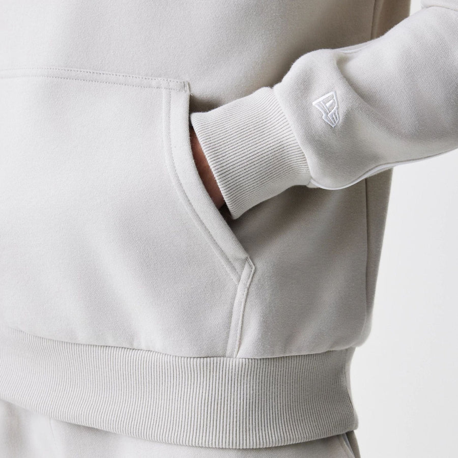 The Male model is wearing LA Lakers NBA Piping Cream Oversized Pullover Hoodie  5